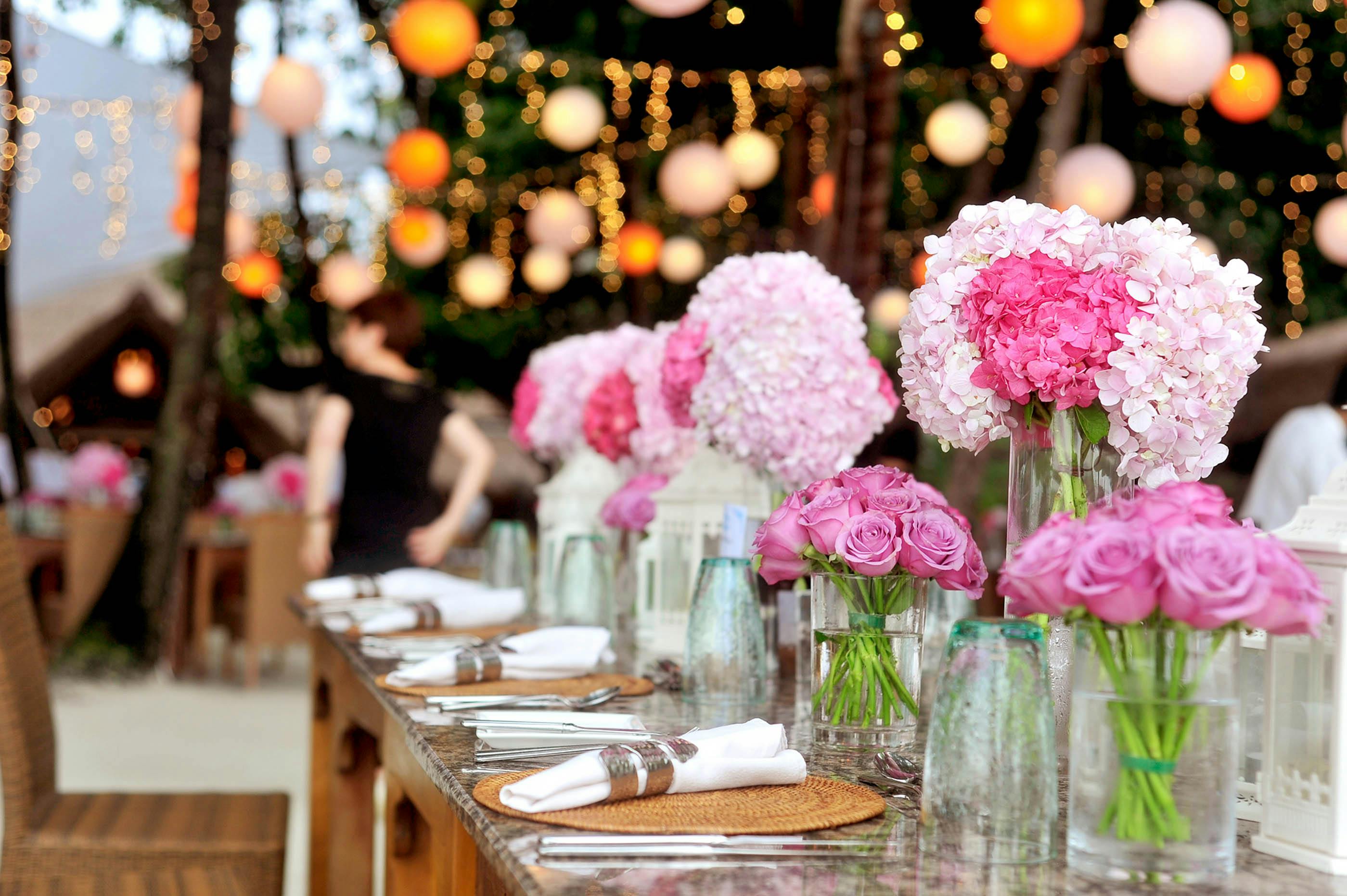 Elegant event setup with flowers and decorations